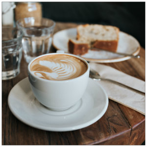 gourmet coffee and pastry on a plate - photo by alisa anton on www.unsplash.com