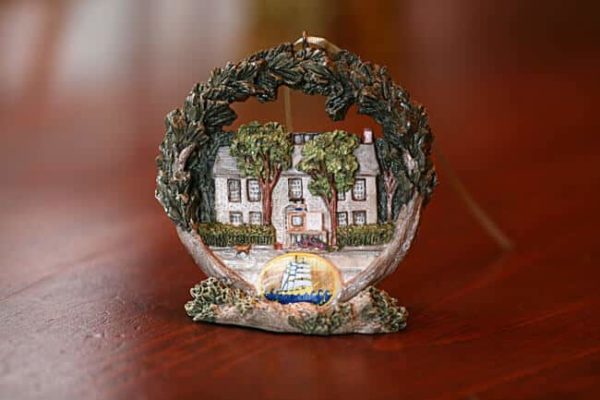 Ornament of Seven Sea Street Inn with a stand
